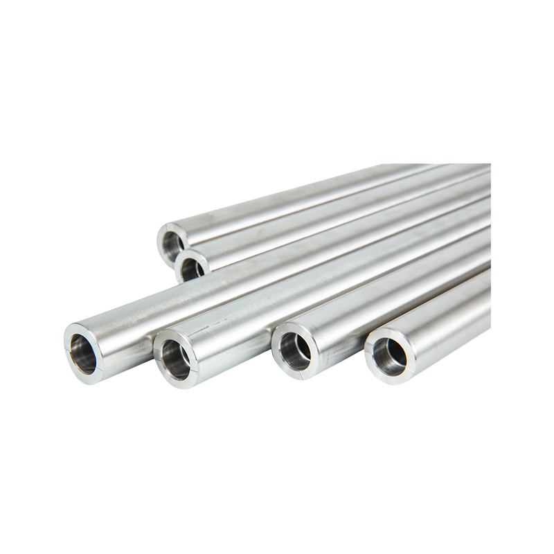 How can the magnetic permeability be reduced through composition optimization in the production of stainless steel electrolytic tubes to meet special requirements?